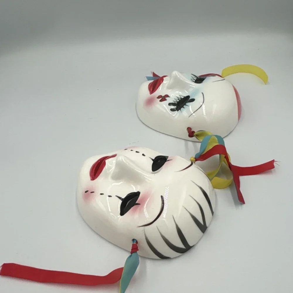 2 White Ceramic Painted carnival Face Masks wall Art